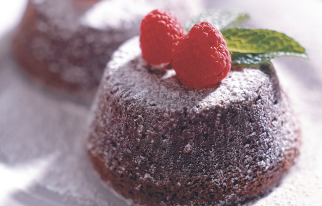 chocolate cake with rasberries on  top
