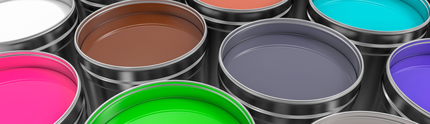 variety of colored paint cans