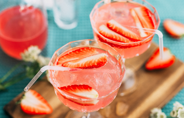pink cocktail drink with strawberries